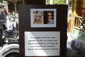 Pictures of killed British tourists David Miller and Hannah Witheridge and a message of support to their friends and families are displayed during special prayers at Koh Tao island