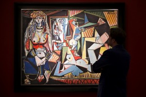 Man pauses to look at Pablo Picasso's "Les femmes d'Alger (Version 'O')" at a media preview for Christie's in the Manhattan borough of New York