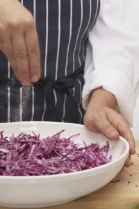 Salting red cabbage, close-up