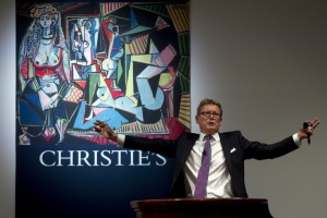 Auctioneer Jussi Pylkkanen calls for final bids before dropping the gavel as he sells Pablo Picasso's "Les femmes d'Alger (Version 'O')" (Women of Algiers) at Christie's Auction House in the Manhattan borough of New York