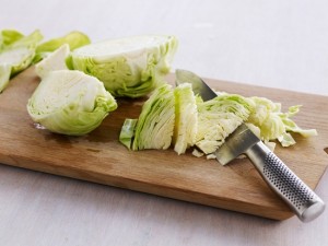 Sliced cabbage on chopping board