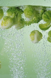 Brussels sprouts and broccoli in cooking water